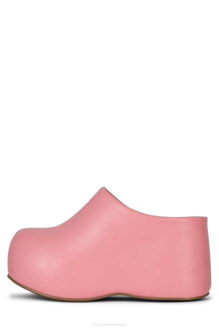 mujer obstruyendo Jeffrey Campbell F6JX12 bota de plataforma rosa