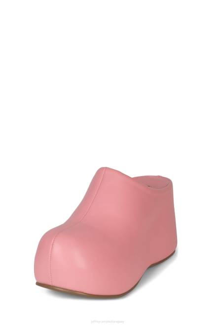 mujer obstruyendo Jeffrey Campbell F6JX12 bota de plataforma rosa